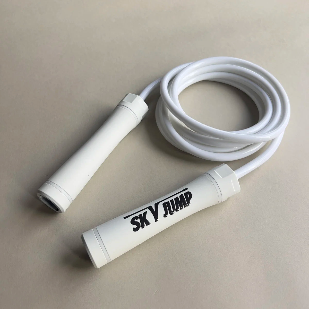 Corde à sauter lestée blanche SkyJump pour entraînement cardio