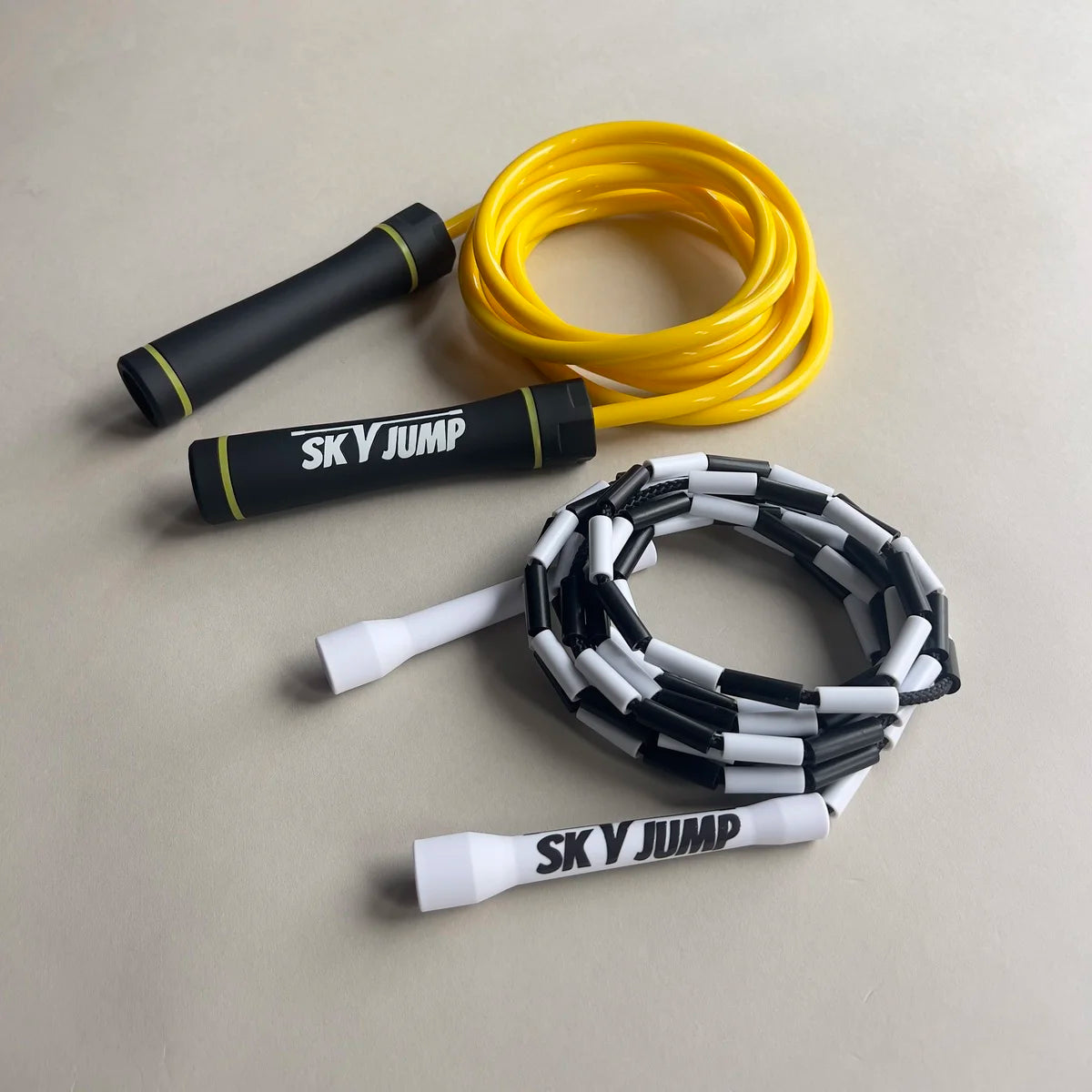 Pack Duo +1 SkyJump : corde à sauter lestée et corde perlée